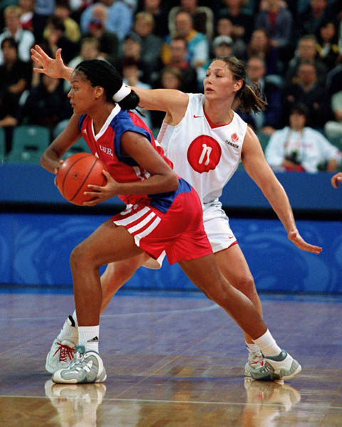 Canada's Dianne Norman (11) competes in women's basketball action at the Sydney 2000 Olympic Games. (CP PHOTO/ COA)