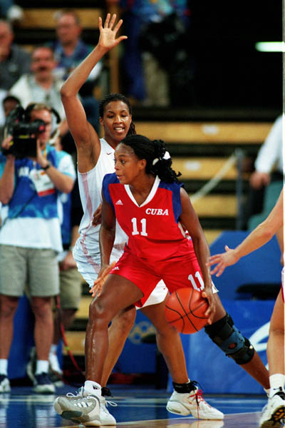 Canada's Tammy Sutton-Brown (behind) participates in basketball action at the Sydney 2000 Olympic Games. (CP PHOTO/ COA)