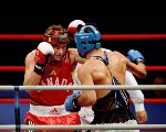 Canada's Artur Binkowski (right) participates in a boxing match at the 2000 Sydney Olympic Games. (CP Photo/ COA)
