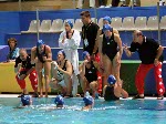 Canadian women's waterpolo coach Daniel Berthelette (right) gives out instructions during a preliminary match against Australia at the 2000  Sydney Olympic Games. (CP Photo/COA)