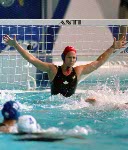 Canada's netminder Josee Marsolais keeps her eyes on the ball during women's waterpolo preliminary action at the 2000 Sydney Olympic Games. (CP Photo/COA)