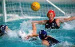 Canada's Jana Salat (left) participates in women's waterpolo preliminary action at the 2000 Sydney Olympic Games. (CP Photo/COA)
