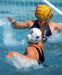 Canada's Jana Salat (left) participates in women's waterpolo preliminary action at the 2000 Sydney Olympic Games. (CP Photo/COA)