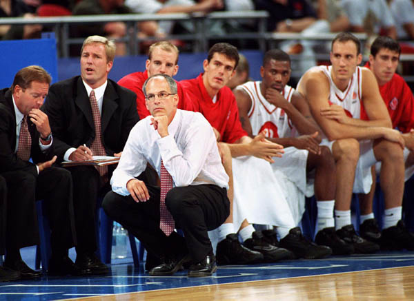 Canada's men's basketball team and coaches watch the action at the 2000 Sydney Olympic Games. (CP Photo/ COA)