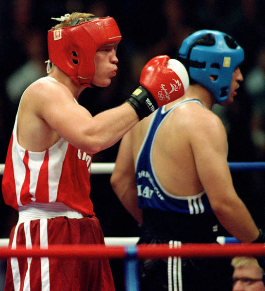 Canada's Mark Simmons (left) competes in the boxing event of the 2000 Sydney Olympic Games. (CP Photo/ COA)