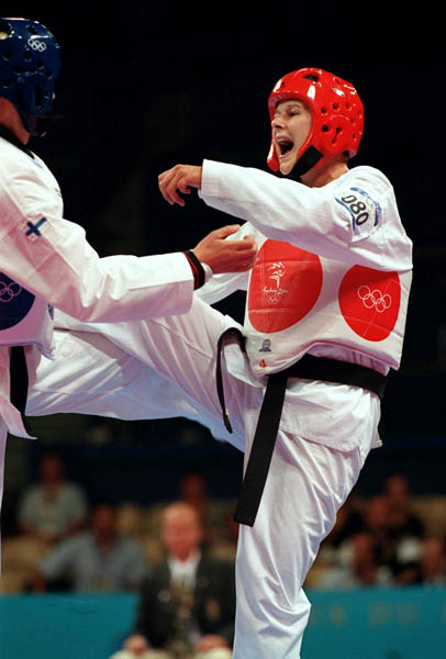 Canada's Dominique Bosshart competes in the Taekwondo event of the 2000 Sydney Olympic Games. (CP PHOTO/ COA)