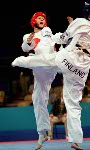 Canada's Dominique Bosshart (blue) of Winnipeg competes with Daniela Castrignano of Italy in the women's plus 67kg taekwondo at the Athens Olympics on Sunday Aug. 29, 2004. (CP PHOTO/COC-Mike Ridewood)