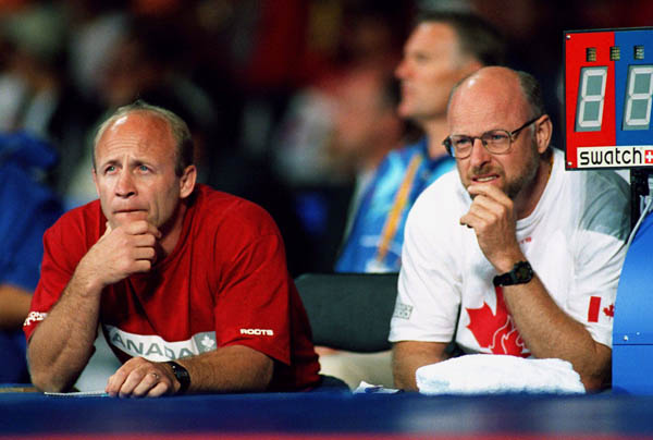 Canada's Dave McKay (left) coaches at the wrestling event at the 2000 Sydney Olympic Games. (CP Photo/ COA)