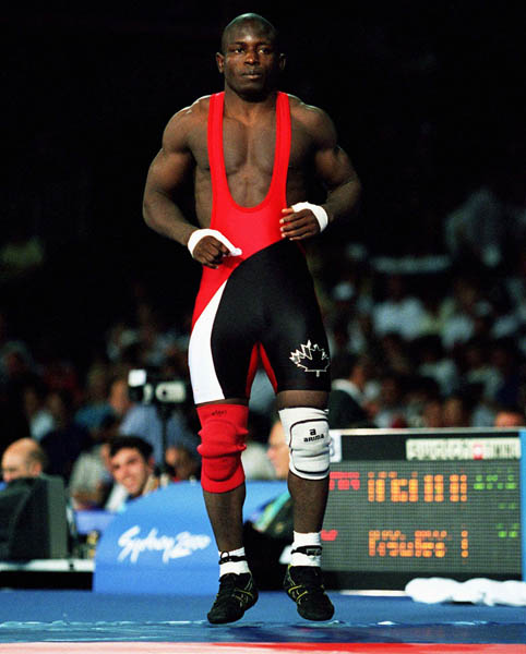 Canada's Daniel Igali competes in the wrestling event at the 2000 Sydney Olympic Games. (CP Photo/ COA)