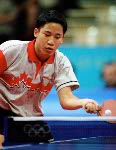 Canada's Kurt Lui plays table tennis at the 2000 Sydney Olympic Games. (CP PHOTO/ COA)