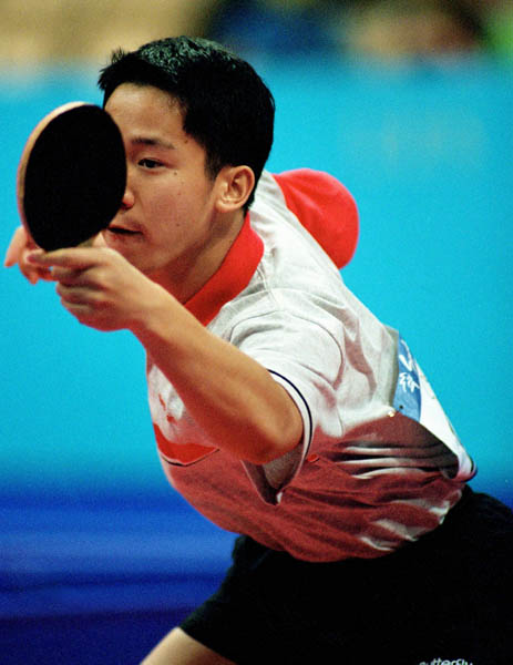 Canada's Kurt Lui plays table tennis at the 2000 Sydney Olympic Games. (CP PHOTO/ COA)