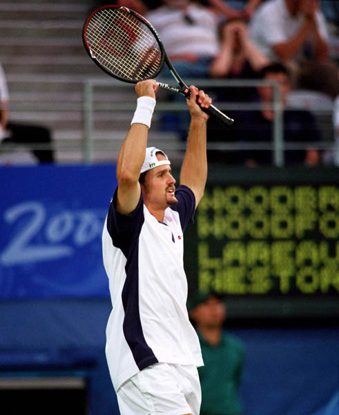 Canada's Sebastien Lareau plays in doubles tennis action at the 2000 Sydney Olympic Games. (Mike Ridewood/CP Photo/ COA)