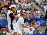 Canada's Daniel Nestor (left) and Sebastien Lareau celebrate after winning gold in men's doubles tennis action at the 2000 Sydney Olympic Games. (Mike Ridewood/CP Photo/ COA)