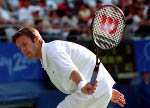 Canada's Daniel Nestor plays a set of doubles tennis at the 2000 Sydney Olympic Games. (Mike Ridewood/CP Photo/ COA)
