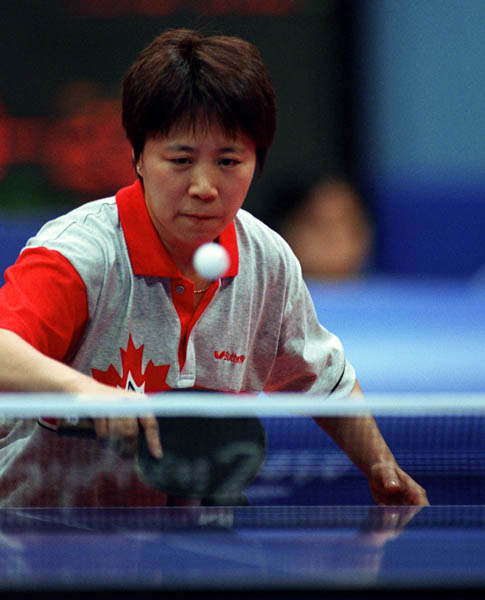 Canada's Lijuan Geng plays table tennis at the 2000 Sydney Olympic Games. (CP PHOTO/ COA)