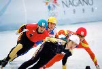 Canada's Derrick Campbell (left) competes in the short track speed skating event at the 1998 Nagano Winter Olympic Games. (CP Photo/ COA/ Scott Grant)