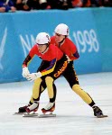 Canada's Tania Vincent and Annie Perreault compete in a short track speed skating relay event at the 1998 Nagano Winter Olympic Games. (CP Photo/ COA/ Scott Grant)
