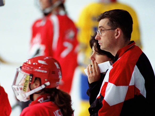 Canada's women's hockey trainer Todd Jackson watches the action at the 1998 Nagano Winter Olympics. (CP PHOTO/COA/Mike Ridewood)