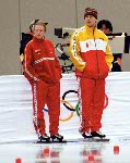 Canada's Catriona Le May Doan (left) holds onto coach Ingrid Paul during the long track speed skating event at the 1998 Nagano Winter Olympic Games. (CP Photo/ COA/ Scott Grant)