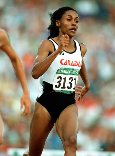 Canada's Rosey Edeh competes in the 400m hurdles during athletics competition at the 1996 Olympic games in Atlanta. (CP PHOTO/ COA/Claus Andersen)