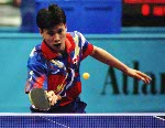 Canada's Gideon Joe Ng (left) and Johnny Huang  compete in the table tennis event at the 1996 Atlanta Olympic Games. (CP Photo/COA/Scott Grant)