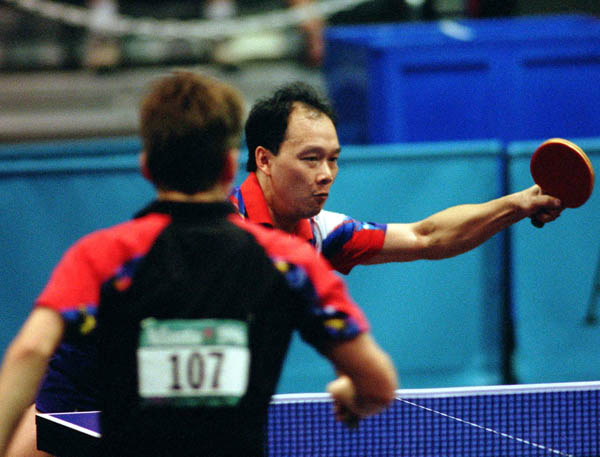 Canada's Gideon Joe Ng  (right) competes in the table tennis event at the 1996 Atlanta Olympic Games. (CP Photo/COA/Scott Grant)