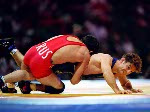 Canada's Paul Ragusa (right) competes in the wrestling event at the 1996 Atlanta Olympic Games. (CP Photo/COA/Mike Ridewood)