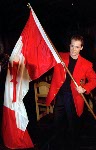 Kurt Browning holds up the Maple Leaf during his nomination as Canada's flag bearer for the opening ceremonies at the 1994 Winter Olympics in Lillehammer. (CP Photo/COA/F. Scott Grant)