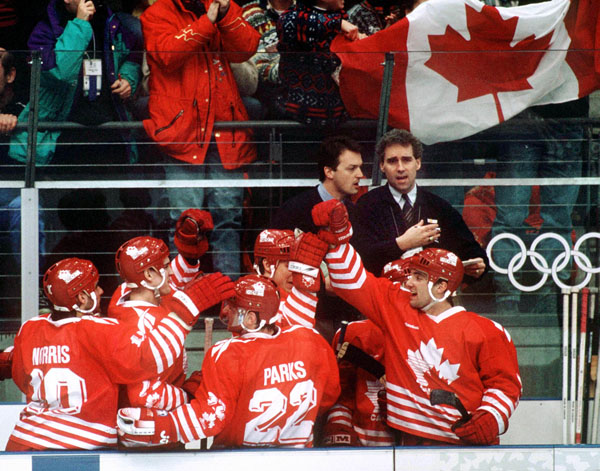 Canada's men hockey team celebrates at the 1994 Winter Olympics in Lillehammer. (CP Photo/COA/Claus Andersen)