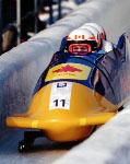 Canada's Pierre Lueders, Dave MacEachern, Jack Pyk and Pascal Caron compete in the four-man bobsleigh event at the 1994 Lillehammer Winter Olympics. (CP Photo/COA/F. Scott Grant)