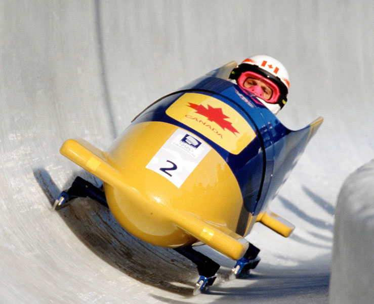 Canada's Dave MacEachern and Pierre Lueders compete in the two-man bobsleigh event at the 1994 Lillehammer Winter Olympics. (CP PHOTO/ COA/F. Scott Grant)