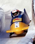 Canada's Chris Lori, Glenroy Gilbert, Sheridon Baptiste and Chris Farstad compete in the 4 man bobsleigh event at the 1994 Lillehammer Winter Olympics. (CP PHOTO/ COA)