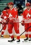 Canada's Brad Werenka (left) and Derek Mayer participate in hockey action at the 1994 Winter Olympics in Lillehammer. (CP Photo/COA/Claus Andersen)