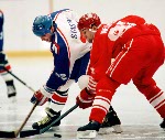 Canada's Petr Nedved (left) and Paul Kariya compete in hockey action against Sweden at the 1994 Winter Olympics in Lillehammer. (CP Photo/COA/Claus Andersen)