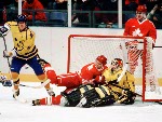 Canada's Petr Nedved (left) and Paul Kariya compete in hockey action against Sweden at the 1994 Winter Olympics in Lillehammer. (CP Photo/COA/Claus Andersen)