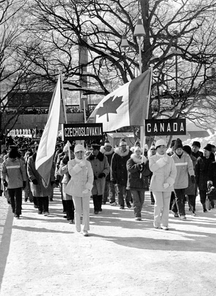 Canada's Karen Magnussen carries the canadian flag during the opening ceremonies of the 1972 Sapporo winter Olympics. (CP Photo/COA)