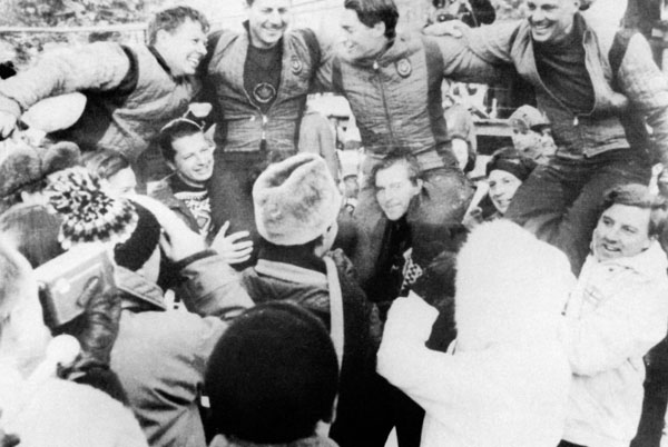 Canada's bobsleigh team (left to right), Peter Kirby, Vic Emery, Doug Anakin and John Emery, celebrates its gold medal win at the 1964 Innsbruck winter Olympics. (CP Photo/COA)