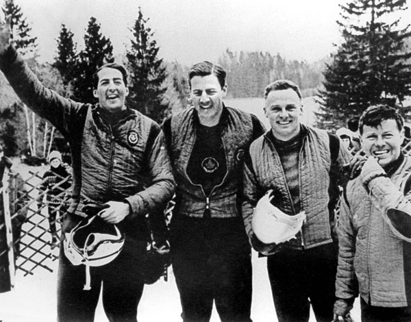 Canada's four-men bobsleigh team, Doug Anakin, Vic Emery, John Emery and Peter Kirby, celebrates its gold medal performance at the 1964 Innsbruck winter Olympics. (CP Photo/COA)