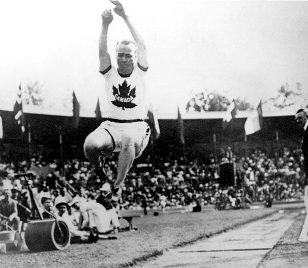 Canada's Calvin Bricker leaps towards a silver medal performance in the long jump event at the 1912 Stockholm summer Olympics. (CP Photo/COA)