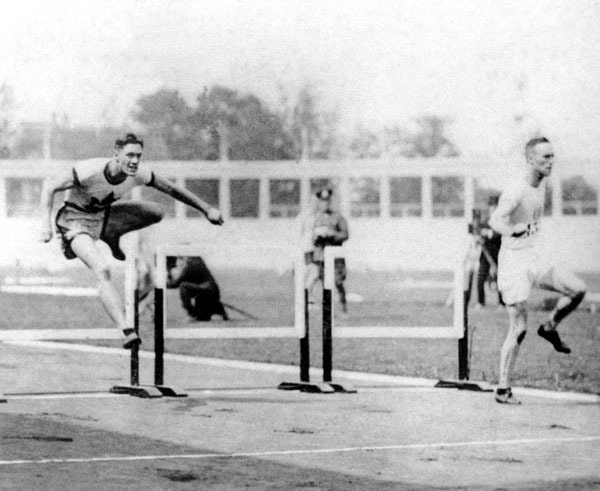 Canada's Earl Thompson (left) competes in the hurdles event at the 1920 Antwerp summer Olympics. He won the gold medal. (CP Photo/COA)