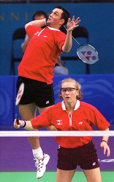 Canada's Milaine Cloutier and Bryan Moody play a set of mixed doubles badminton at the 2000 Sydney Olympic Games. (CP Photo/ COA)