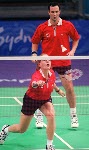 Charmaine Reid of Calgary hits the birdie during a badminton training for the summer Olympic Games in Athens, Greece, Tuesday, August 10, 2004. (CP PHOTO/COC-Mike Ridewood)