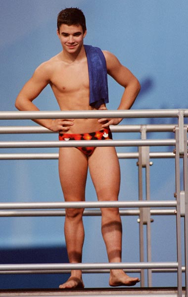 Canada's Alexandre Despatie looks down from the diving platform  at the 2000 Sydney Olympic Games. (CP Photo/ COA)