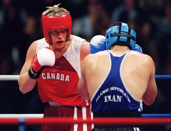 Canada's Mark Simmons participating in the boxing portion of the 2000 Sydney Olympic Games. (CP Photo/ COA)