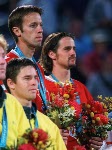 Canada's Daniel Nestor (L) and Sebastien Lareau (R) stand on the podium during the presentation of the medals for men's doubles tennis at the 2000 Sydney Olympic Games. (Mike Ridewood/CP Photo/ COA)