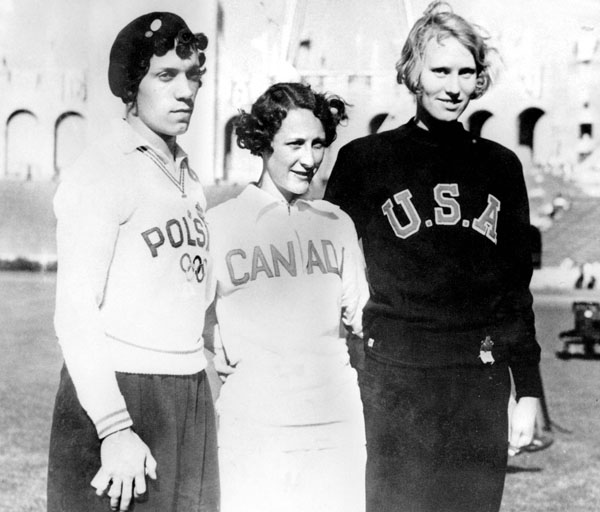 Canada's Hilda Strike (centre) celebrates her silver medal win in the women's 100m event at the 1932 Los Angeles Olympics. (CP Photo/COA)