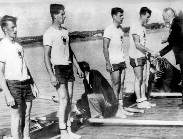Canada's men's 4x rowing team celebrates its gold medal win at the 1956 Melbourne Olympics. (CP Photo/COA)