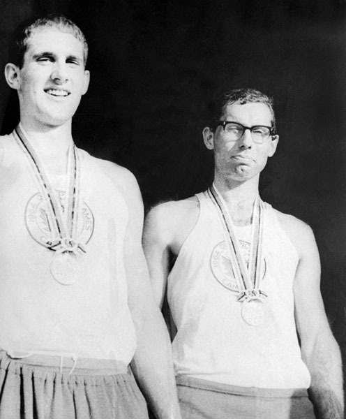 Canada's Roger Jackson and George Hungerford celebrate their gold medal win in the rowing event at the 1964 Tokyo Olympics. (CP Photo/COA)