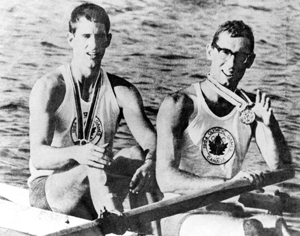 Canada's Roger Jackson and George Hungerford celebrate their gold medal win in the rowing event at the 1964 Tokyo Olympics. (CP Photo/COA)