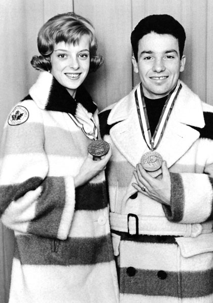 Canada's Debbie Wilkes and Guy Revell celebrate their bronze medal win in the pairs figure skating event at the 1964 Innsbruck winter Olympics. (CP Photo/COA)
